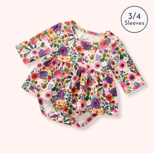 Bloom Bursts Romper — painterly floral print romper with 3/4 sleeves and bubble skirt overlay