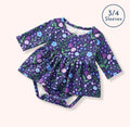 Breezy Blossoms Romper - navy wildflower skirted bodysuit with 3/4 sleeves