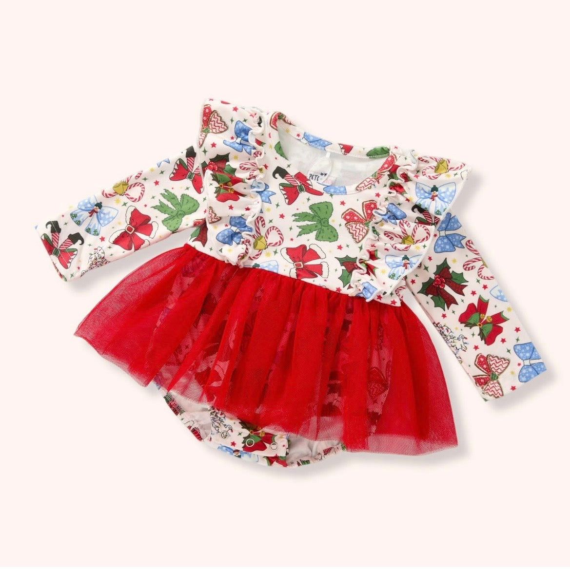 Christmas Bows Romper with colorful holiday bow print, long sleeves, front ruffles, a red mesh skirt overlay, and a snap-bottom romper.